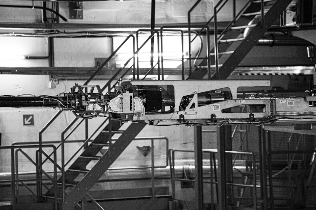 【n8n】バージョン 2025-05-08 リリース！安定性向上バグフィックス【2025年最新】 - a black and white photo of a staircase and a train