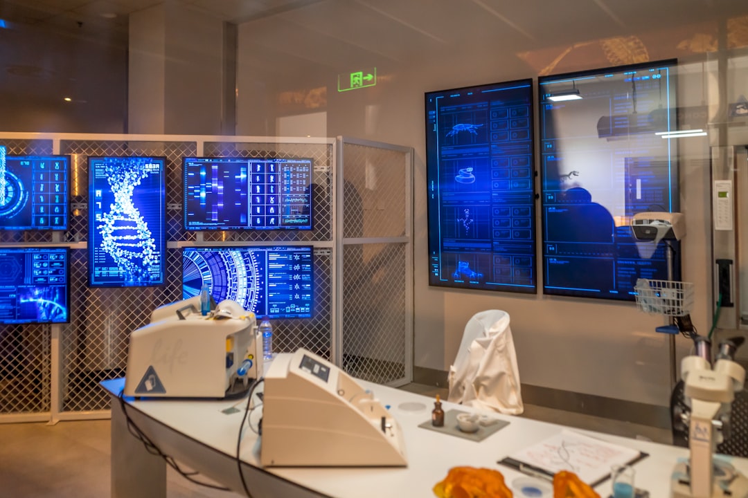 OpenAIが挑む創薬革命「GPT-Rosalind」の衝撃と専門特化AIの未来 - a room with a lot of monitors on the wall