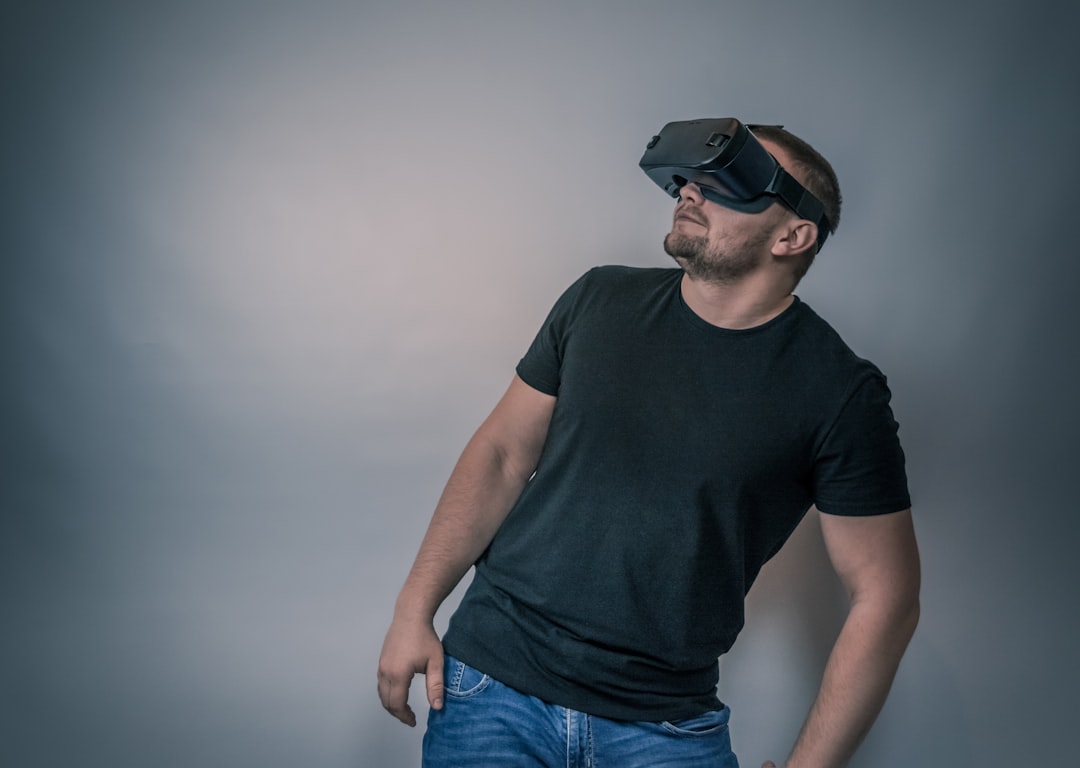 Ray-Ban Metaスマートグラス活用術：AIで日常を拡張する次世代の体験 - Young man with virtual reality glasses. Modern technologies. Image contains excessive noise, film grain, compression artifacts and posterization due to special treatment. More of my photos and videos Adobe Stock:h