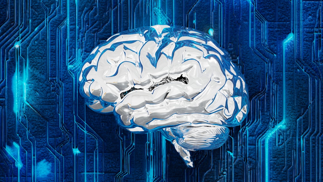 【ChatGPT】最新アップデート！新機能と性能改善を徹底解説 - A digital artwork depicting the synergy between the human brain and artificial intelligence (AI). Featuring futuristic visuals, the metallic, liquid-like brain exudes sophistication, surrounded by electronic circuit patterns symbolizing connectivity and technological evolution. This piece represents a future where AI and humanity collaborate to create limitless innovation.