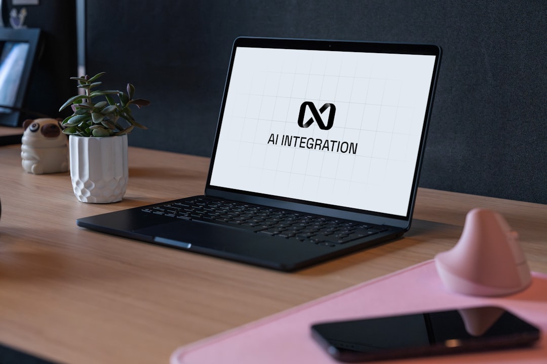 AIエージェントで「一人会社」を経営する：自動化ワークフローの構築術 - Person using a laptop to access AI-driven solutions.