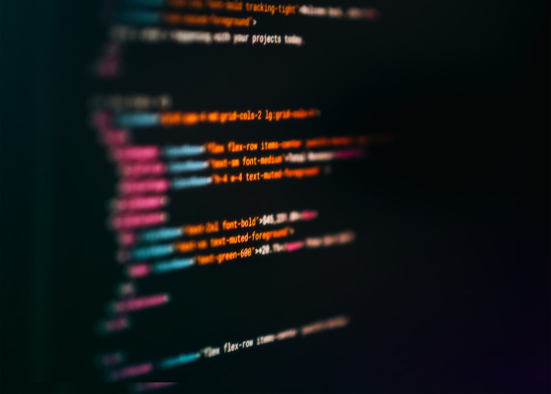 Claude Codeの出力にHTMLを推奨する理由｜Markdownを超えたAI開発の未来 - Colorful HTML Code Snippet Programming Interface. Close-up blurred screen with colorful syntax highlighting of programming markup language